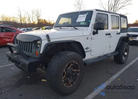 2013 Jeep Wrangler Unlimited Freedom Edition из США, поврежденный, VIN 1C4HJWDG2DL569561